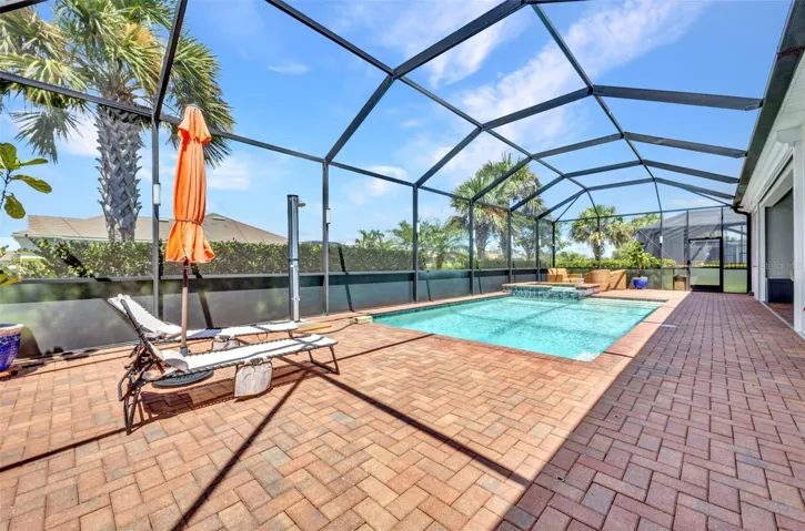 Long view of Lanai, pool and spa.