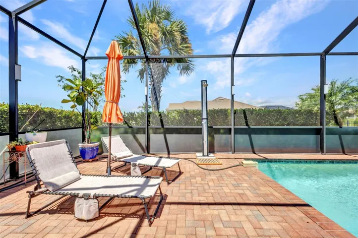 Relax or read a good book. Owner installed an outdoor shower in the back center.
