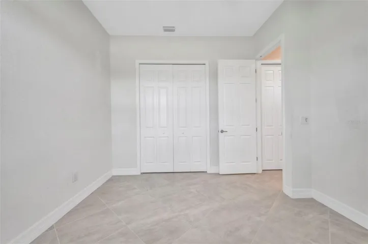 Another guest room or part of the mother-in-law suite.