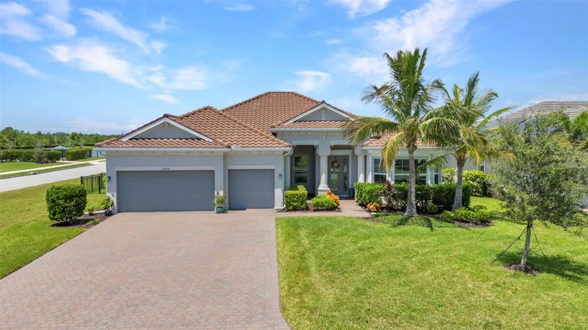 Welcome to 15000 Spanish Point Drive in the gated community of Harbor West.