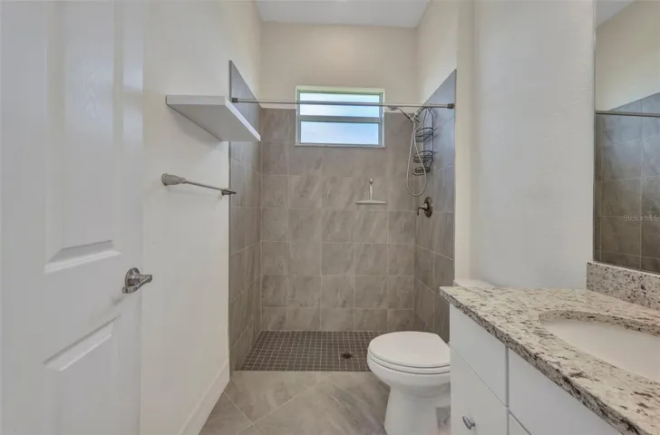 Full shower, single vanity for 