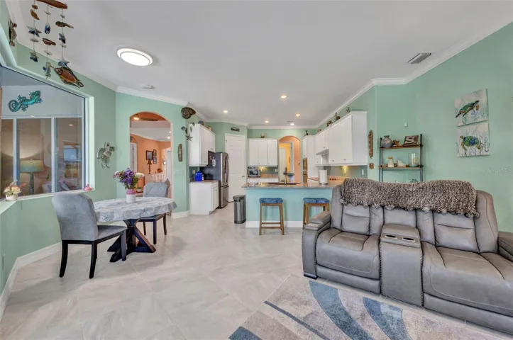 Full view of family room, breakfast nook and kitchen.