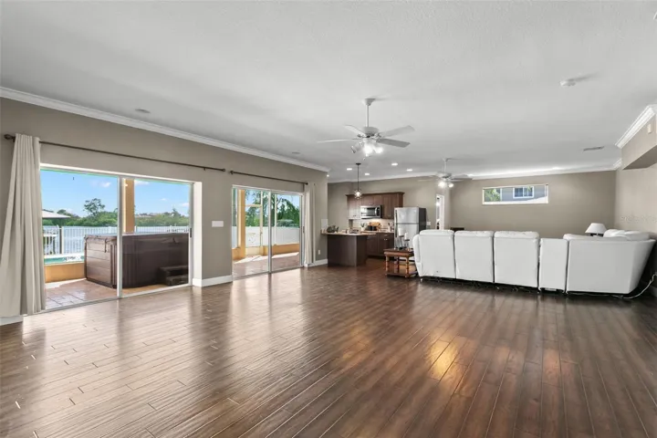 First Floor Bonus Room With Kitchen (no stove, however wired for one), Pool Bath and 1 Full Bedroom