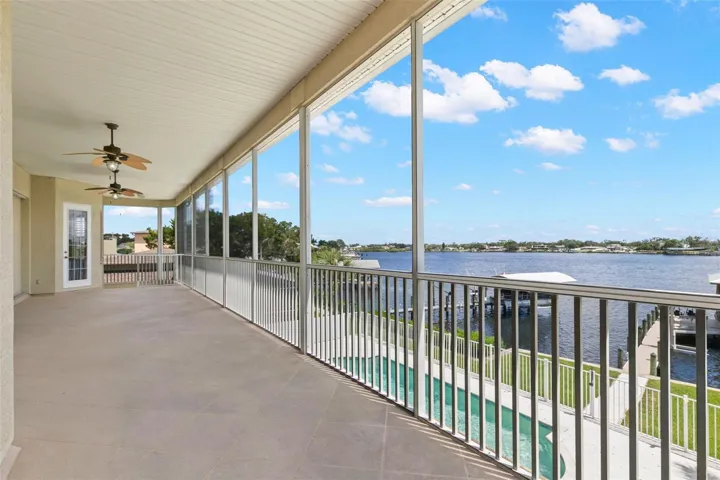 1 of 2 full waterfront screened patios.