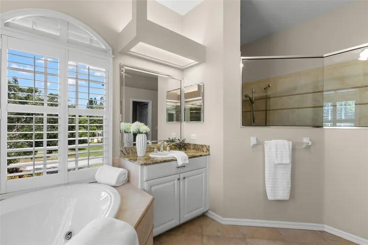 Primary Bath With Garden Tub And Step-In Shower