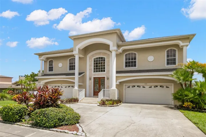 Front of house. Wrap around driveway.