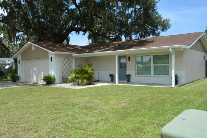 Two car oversized inclosed side garage with extra concrete pad for more parking PLUS NO HOA FEES TO PAY