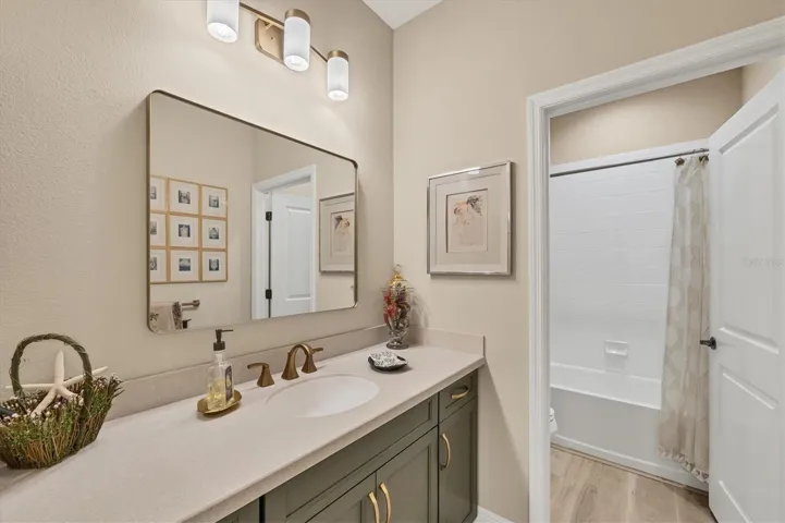 A guest bath was designed to accommodate visitors in comfort and style.