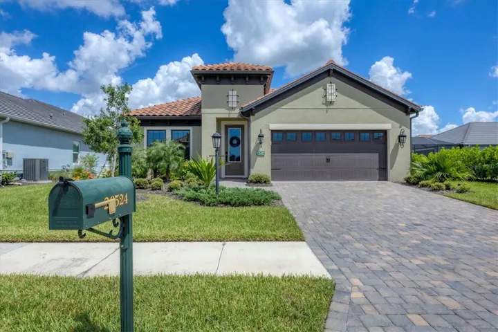 This home features upgrades galore, including a whole-house generator and automated hurricane screens on the lanai.