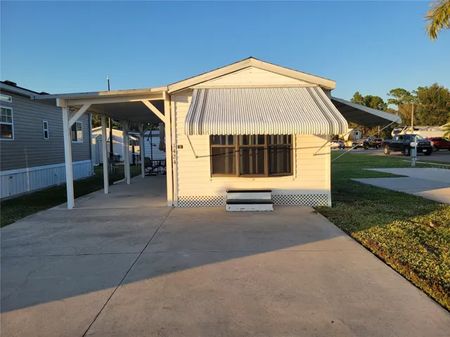 Front of Home double parking and carport