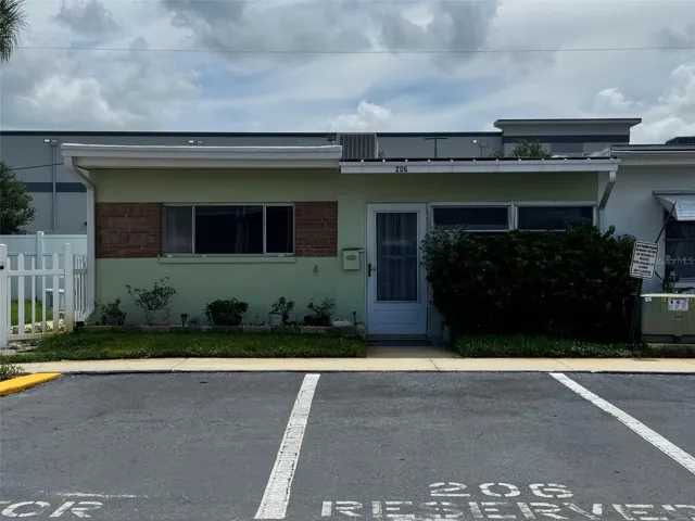 Front - one reserved spot and one visitor spot