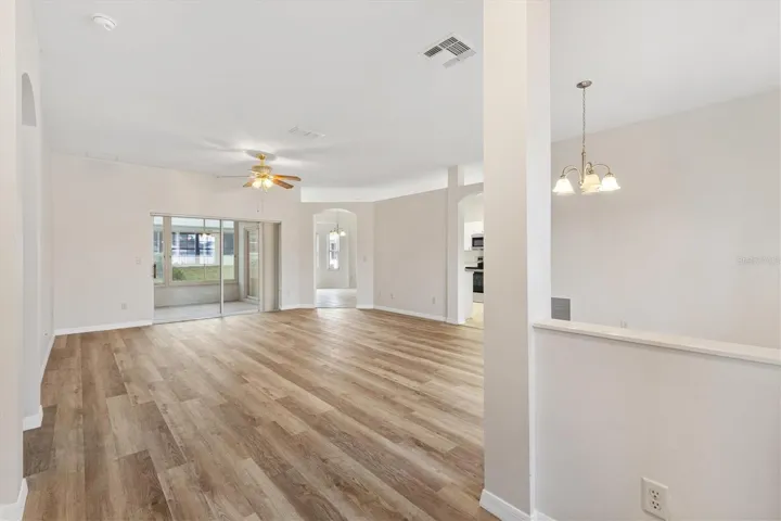 All NEW LVP Flooring thoughtout home, excluding kitchen and baths.