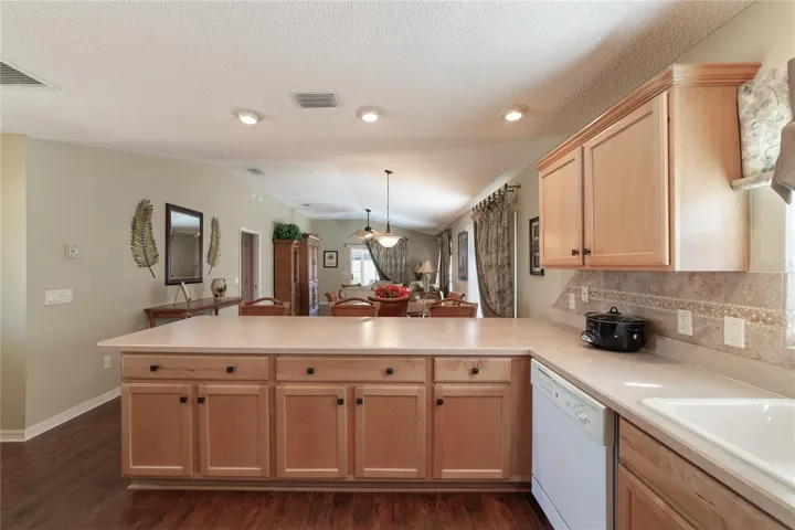 Kitchen looking into living dining area