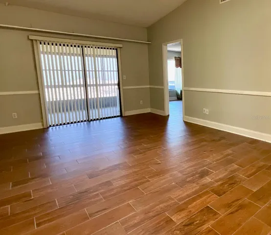 11-Slider to Lanai and doorway to primary bedroom