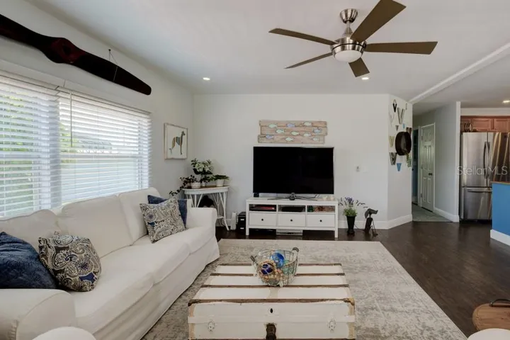 LIVING ROOM WITH LIGHT FILLED LIVING SPACE WITH OPEN FLOW