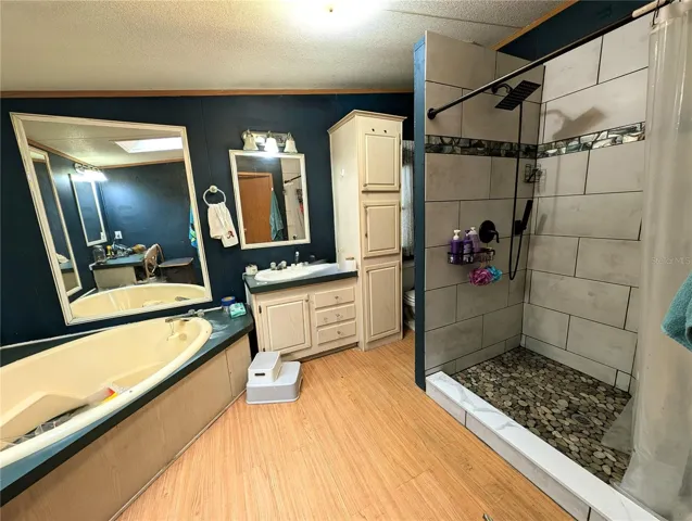 Primary bath with custom shower and garden soaking tub
