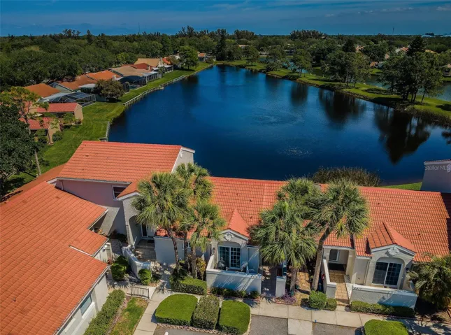 Positioned on a wide lake view. You can see the sparkling water from all living areas.