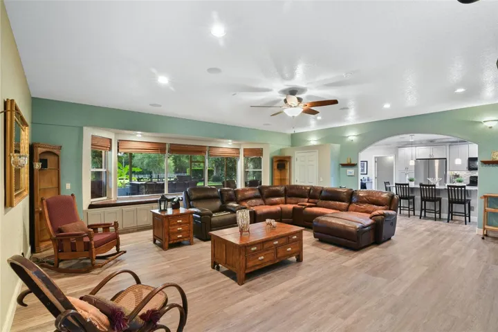 24 x 27ft Main floor living room with views of outdoor living area and front pastures