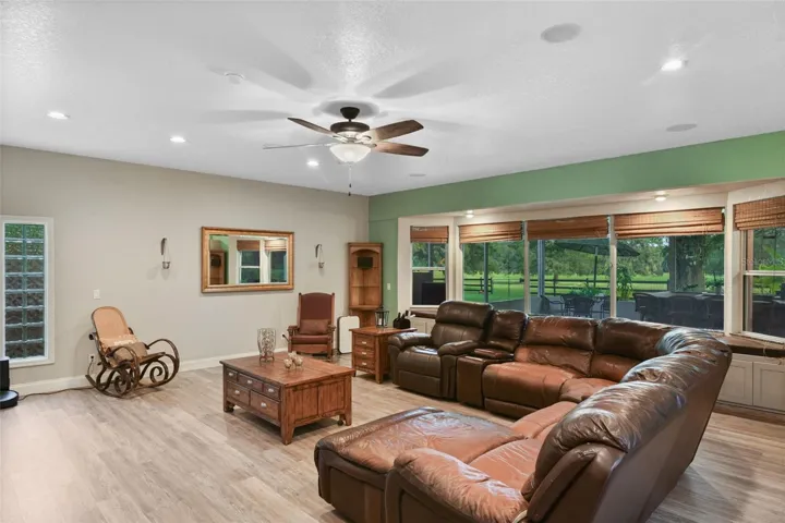 24 x 27ft Main floor living room with views of outdoor living area and front pastures