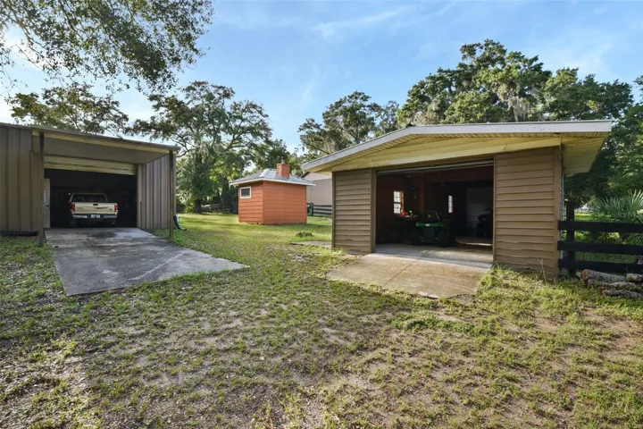 Storage Building to the Right - Back of Garage 1 to the Left