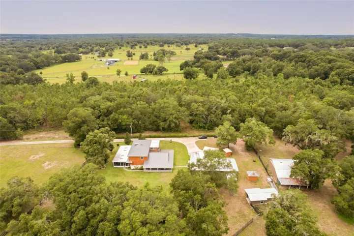 Property layout illustrating the relationship between residence, garages, and acreage