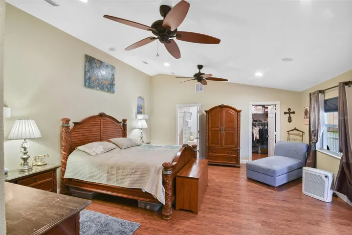 First-floor primary bedroom offering privacy and convenience