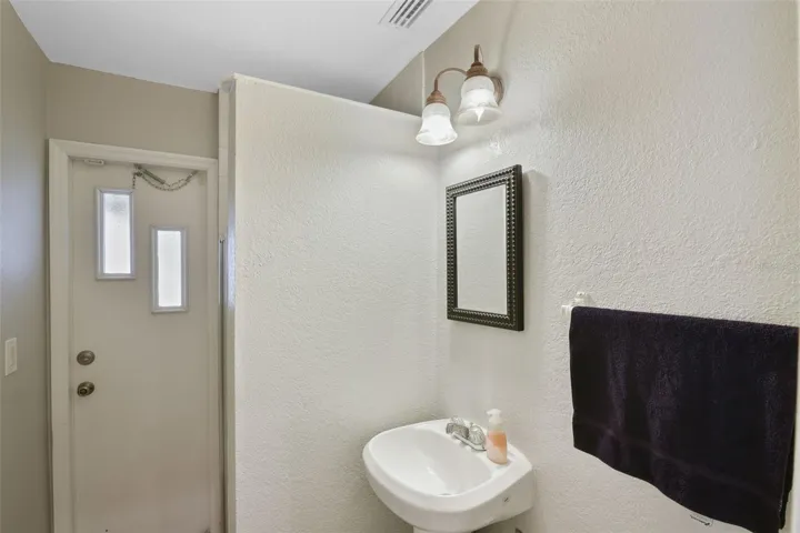 Main floor guest bath #1 (game room)