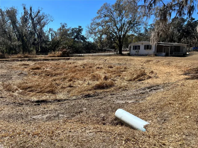 Recent photo (Feb 2026) of pond with very little water because of the lack of rain.
