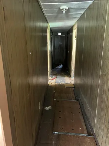 After entering, this hallway is to the left and leads to the bedrooms.