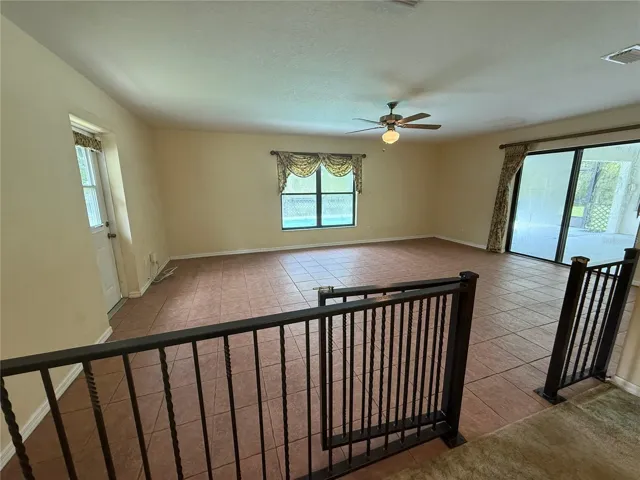 Huge Family Room with sliders to the Pool.