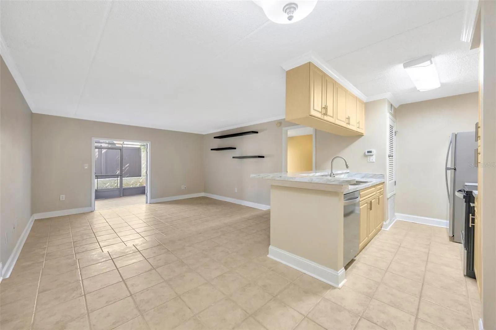 Living room and kitchen from dining