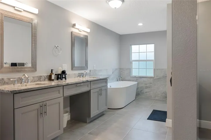 MASTER BATH  SOAKING TUB FULL SHOWER MARBEL VANITY
