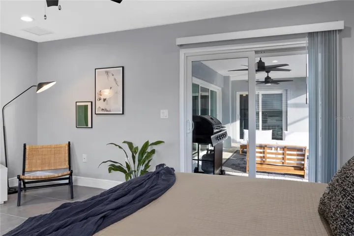 MAIN BEDROOM SLIDERS TO PATIO/POOL