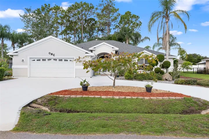 Front elevation with spacious horse shoe  driveway and grand entrance located on  cul-de-sac.