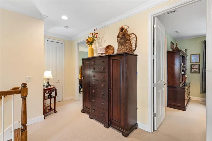 Loft landing with a linen closet.