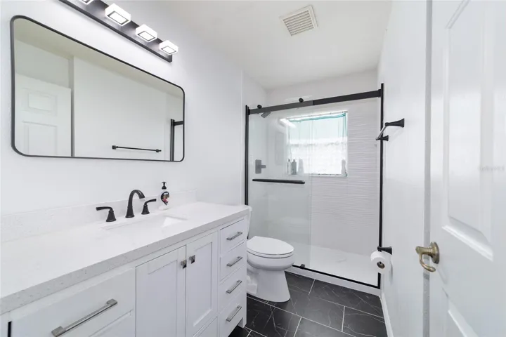 Guest Bathroom #1 with upgraded LVP  floors