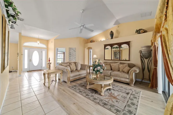 No carpet here. Tile in wet areas and new modern flooring through out the rest of the home