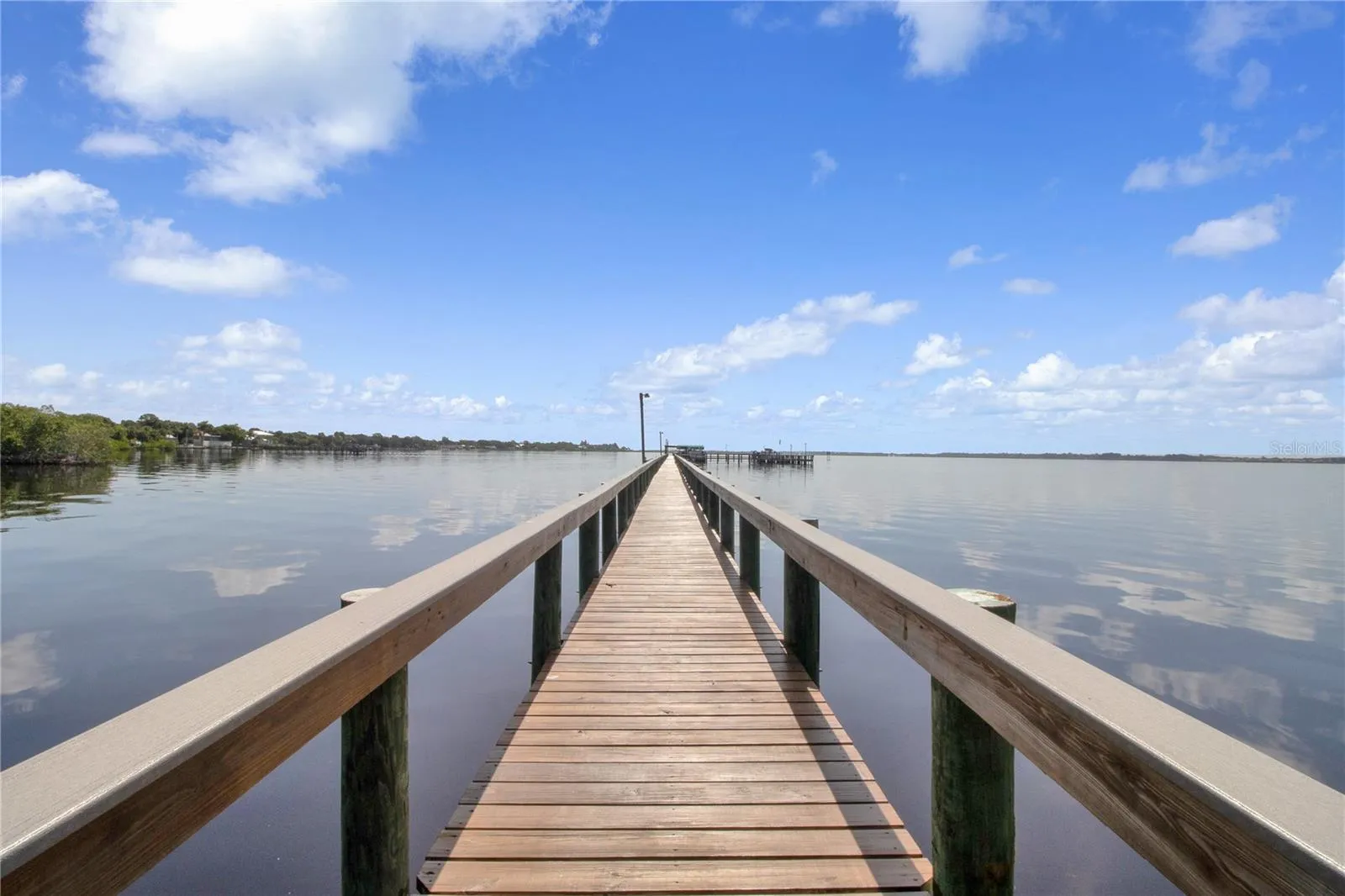 Walking path leading to fishing pier and boat docks. Docks are approved and all assessments paid for rebuild in 2026