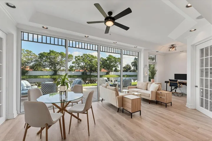 Florida room area can be repurposed into a billiards space with game table