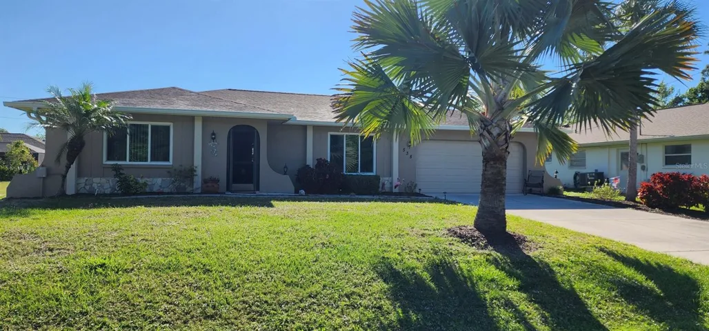 Beautiful 2 Bedroom, 2 Bath, Oversized 2 Car Garage Pool Home