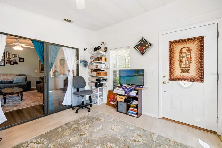 Florida room is off living room.