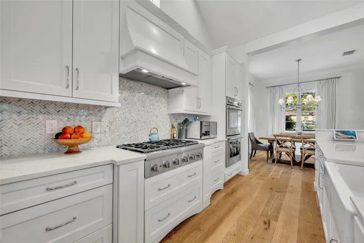 The 6 burner natural gas stove top and a double oven will make meal prep a breeze