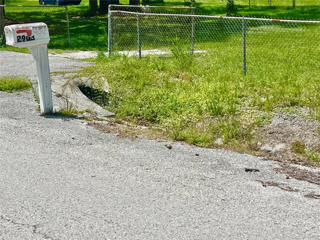 there's a drainage ditch between the fence and the road.  The family has owned this property for over 45 years, and it has never flooded until Oct 2024.
