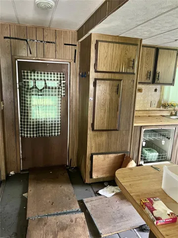 This door leads to the backyard and screened patio.