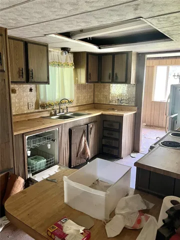 The kitchen is adjacent.  Some of the items in the kitchen may be salvageable.