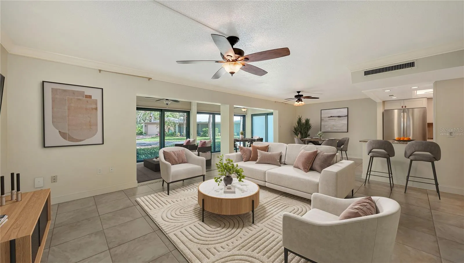Virtually staged living and dining spaces.