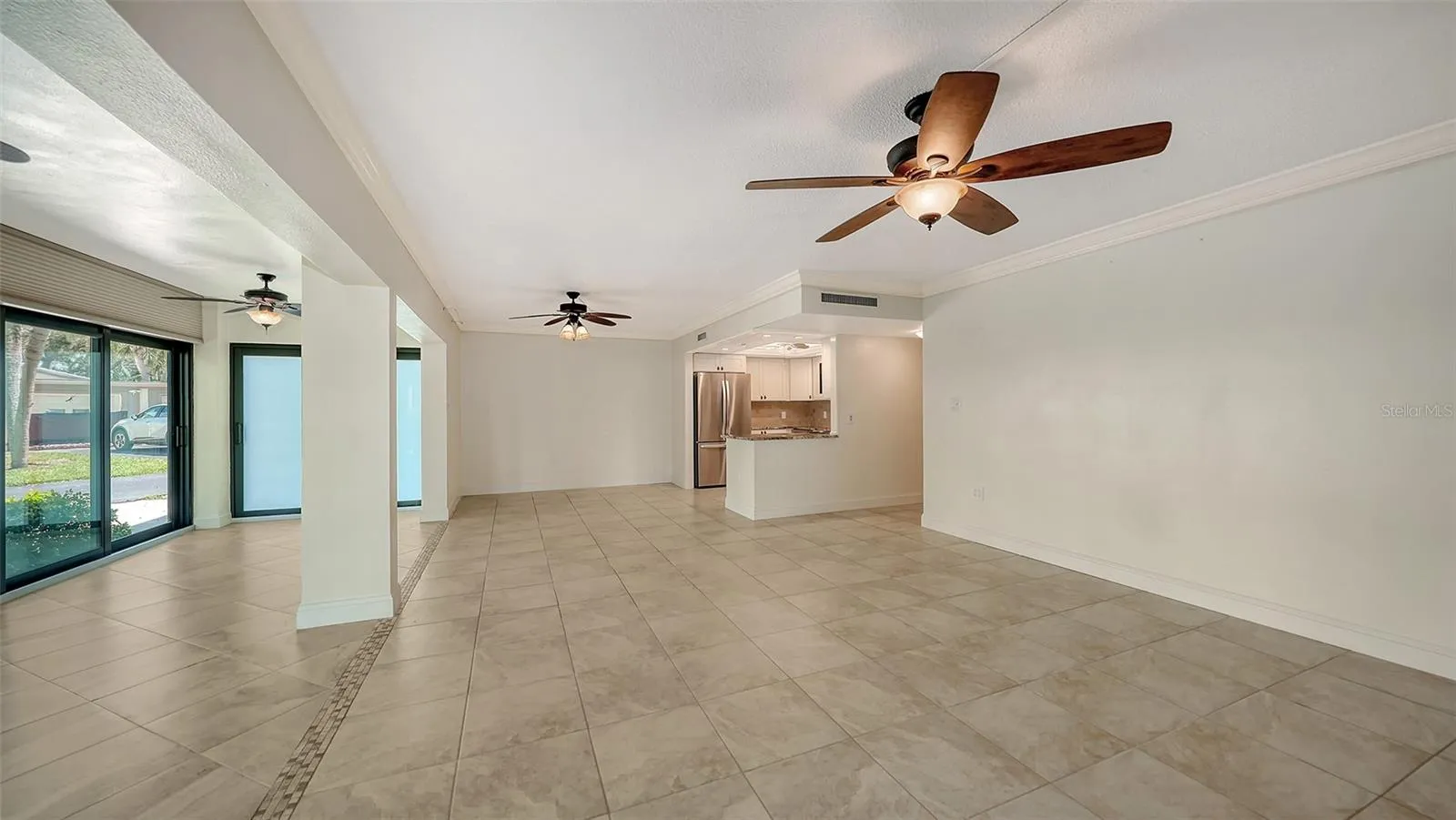 View from living room to the dining space and kitchen.