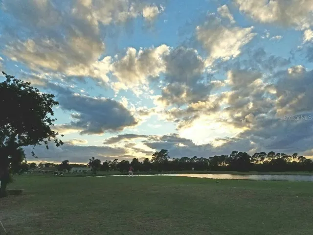 Walk to Hidden Lakes Golf Club or easy golf cart ride of NSB Municipal Course.