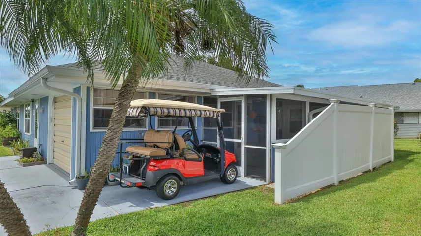 Golf Cart parking.  Screen room easily converted to covered parking for it.