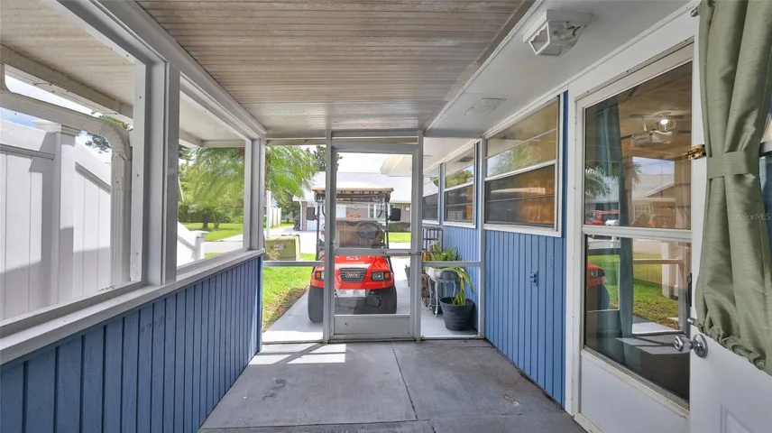 Screen room easily converted to park your golf cart.